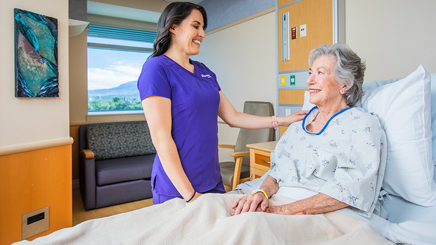 Renown Health nurse comforting patient